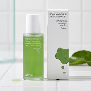 Ampolla facial Celimax Noni de KSTANDARBEAUTY con extracto de noni, pantenol y colágeno para calmar e iluminar la piel.