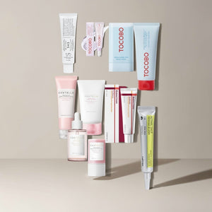 Colección de cuidado de la piel KSTANDARBEAUTY con productos de centella, TOCOBO y más. Incluye sérum, crema y protector solar.